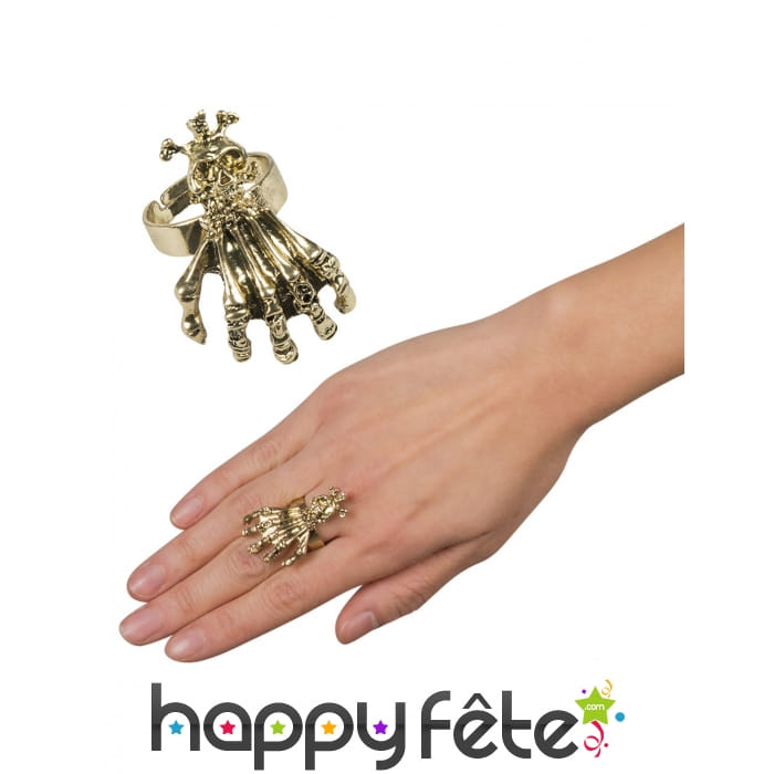 Bague main et tête de mort en métal doré