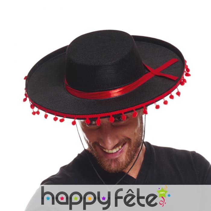 Chapeau traditionnel espagnol avec pompons rouges