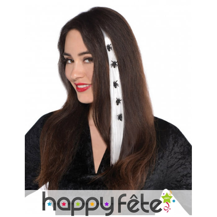 Mèche blanche de cheveux avec araignées