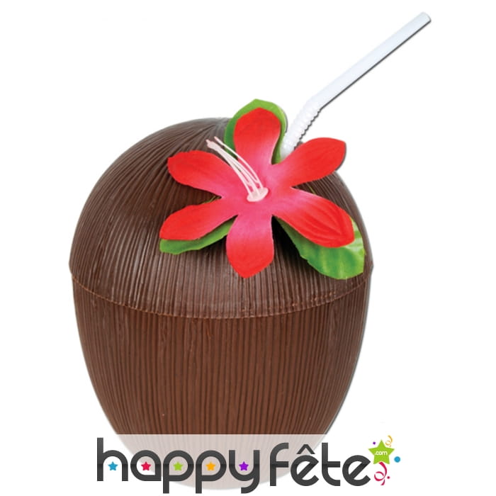 Noix de coco avec paille et fleur