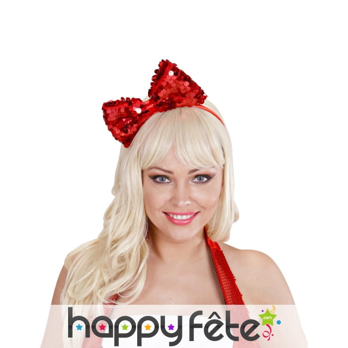 Noeud rouge recouvert de sequins sur serre tete