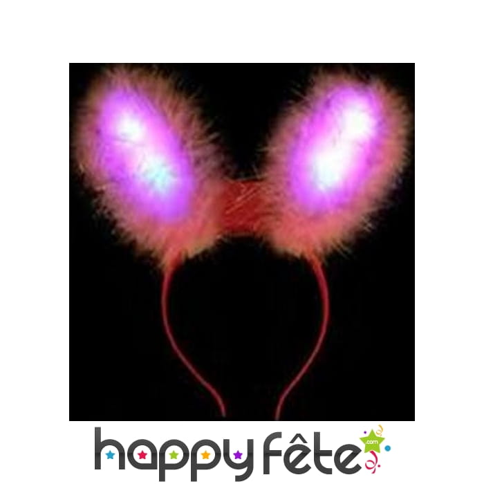 Oreilles de lapin rose lumineuses sur serre tête