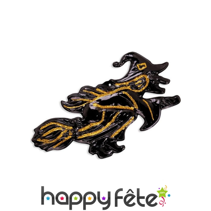 Sorcière noire et dorée sur son balais 58cm