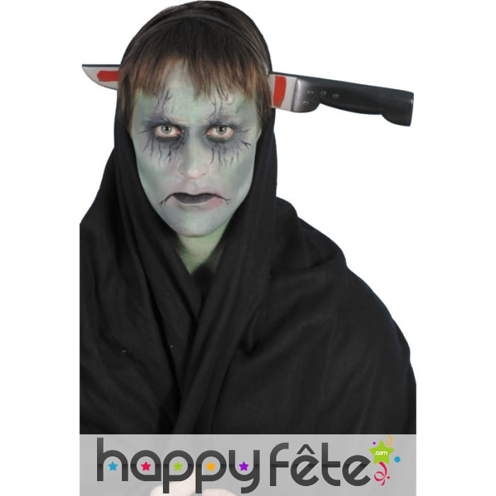 Serre tête couteau dans la tête