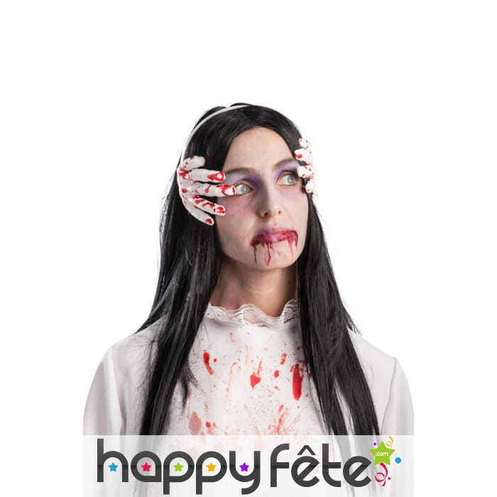 Serre tête mains ensanglantées