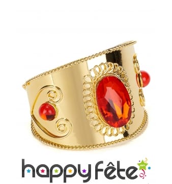 Bracelet doré serti de pierres rouges