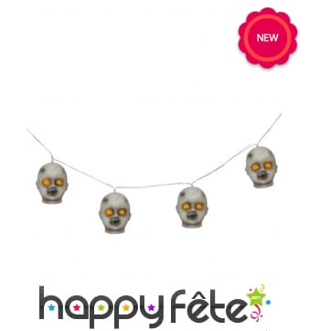 Guirlande têtes de poupées lumineuses