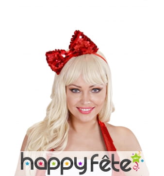 Noeud rouge recouvert de sequins sur serre tete