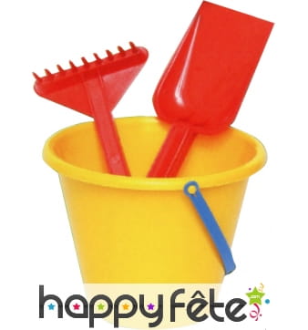 Seau avec pelle et rateau de plage