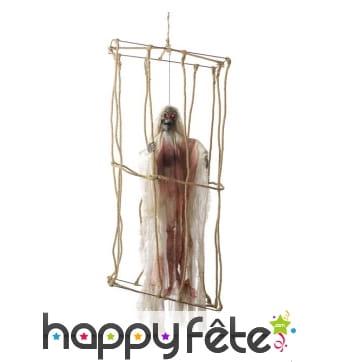 Squelette animé yeux lumineux en cage