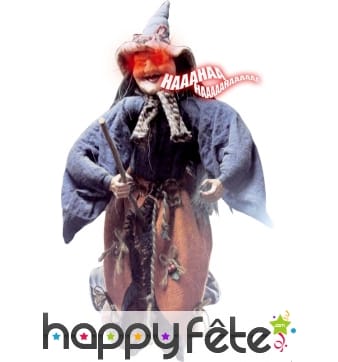 Sorcière sur balai qui ricane