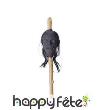 Tête réduite empalée sur un bambou, 50 x 13cm
