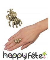 Bague main et tête de mort en métal doré
