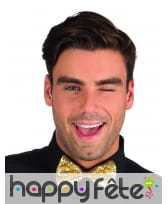 Noeud papillon doré couvert de paillettes