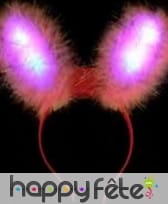 Oreilles de lapin rose lumineuses sur serre tête