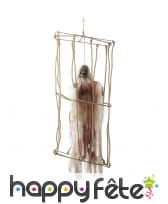 Squelette animé yeux lumineux en cage